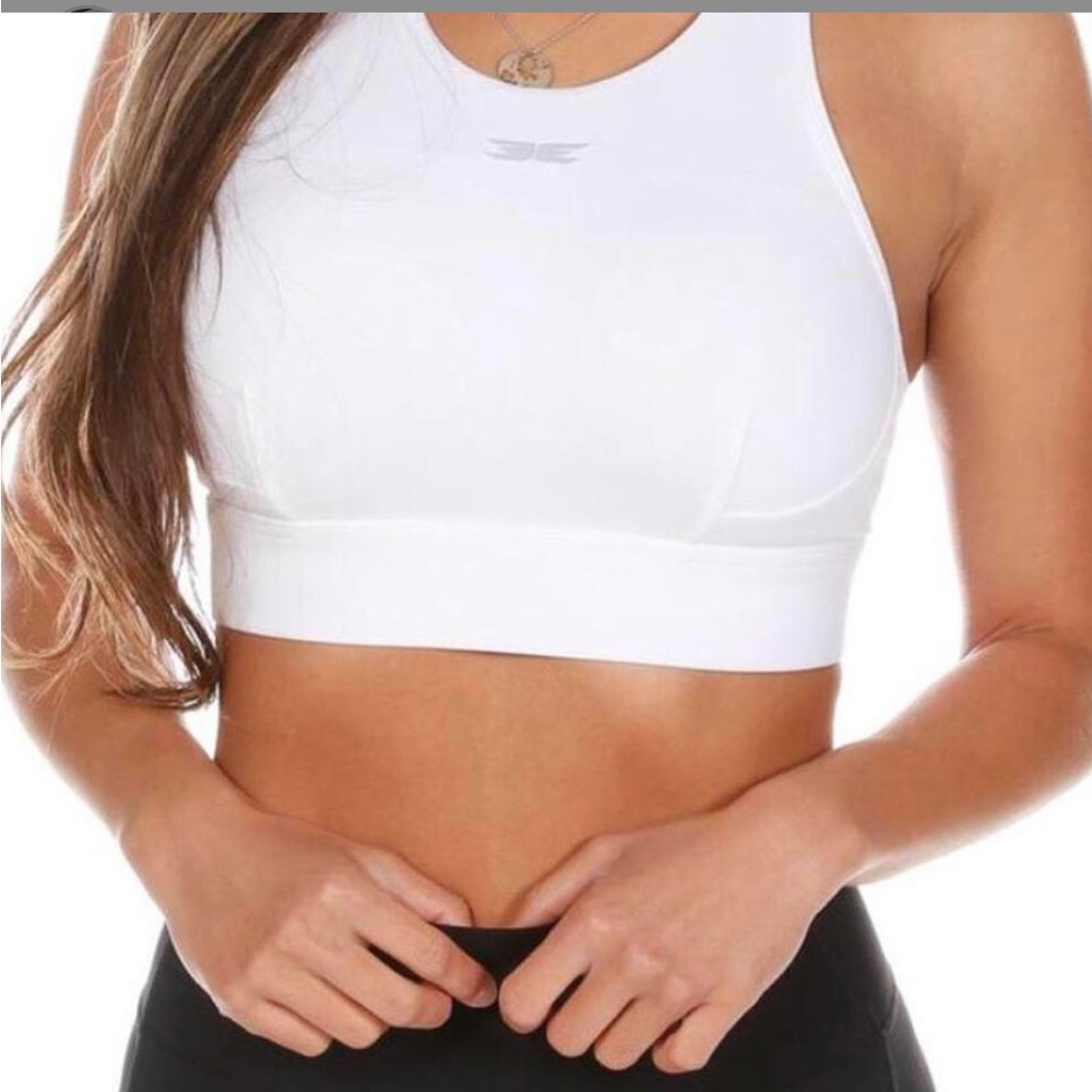 White crop top bra by elite 11 size. XS.